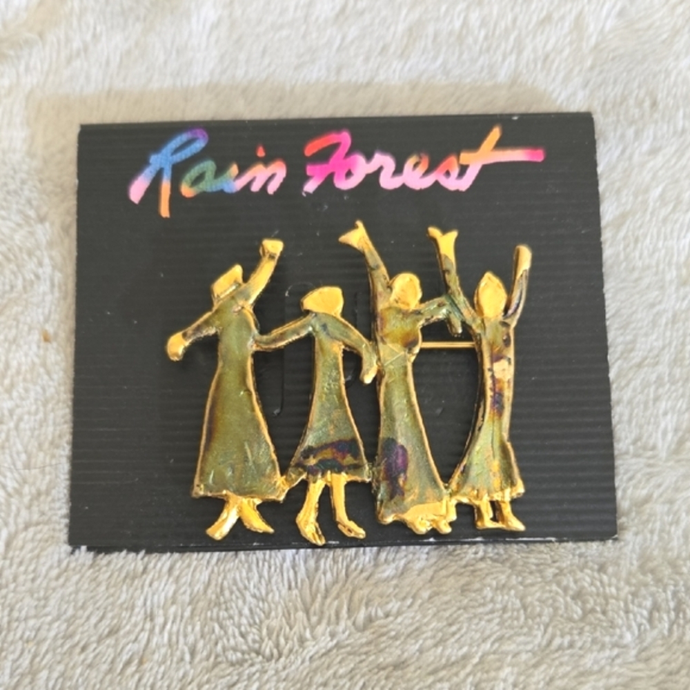 #642 RAINFOREST Gold Tone Dancing Figures Brooch